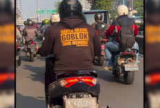 Gokil! Pengendara Motor Ini Menyindir Keras Perokok di Jalan Lewat Jaketnya